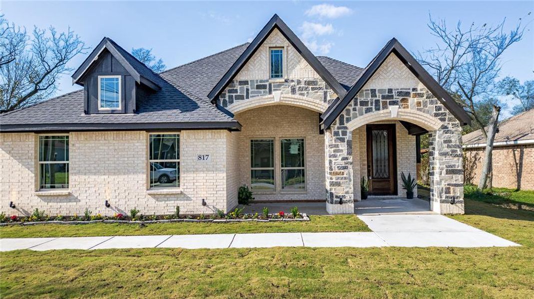Front exterior of a new home in , Terrell, TX, highlighting curb appeal (Image 2).