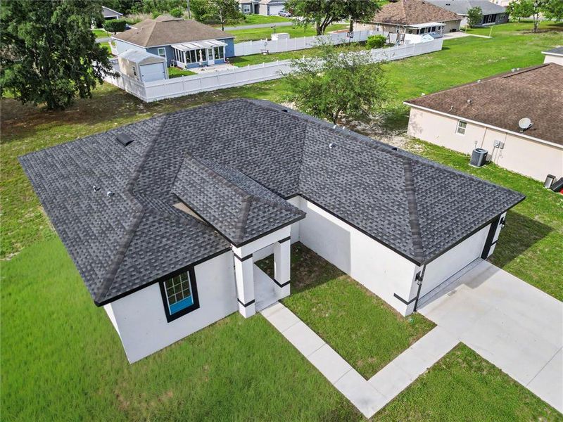 Front exterior of a new home in , Ocala, FL, highlighting curb appeal (Image 29).