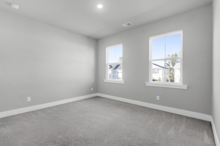 Spacious, unfurnished interior of a new home in Carnes Crossroads: Coastal Collection, Summerville (Image 26).