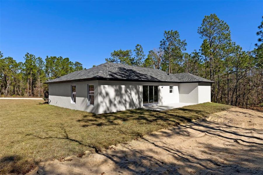Exterior details and patio area of a home in , Brooksville (Image 22).