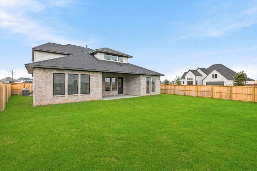 Exterior details and patio area of a home in Elyson, Katy (Image 20).