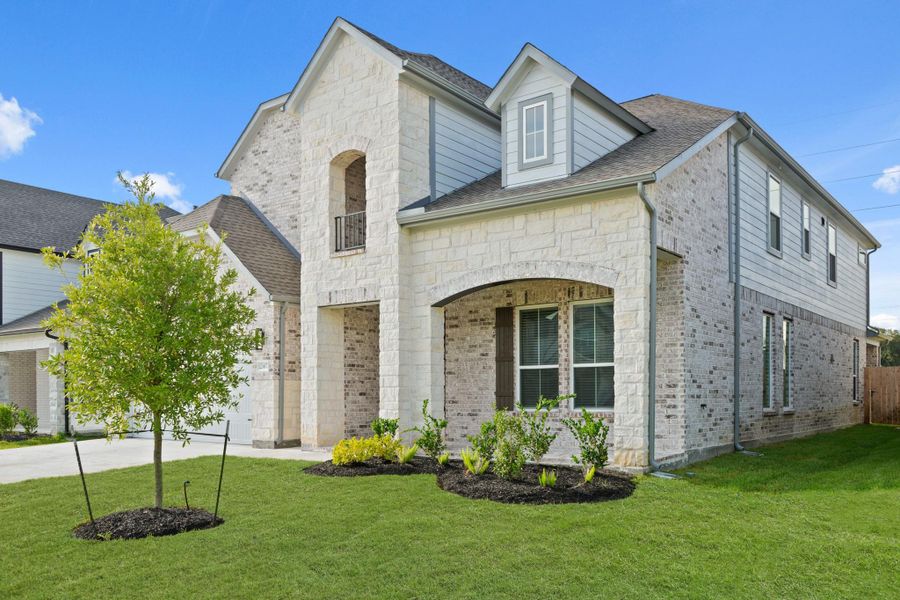 Front exterior of a new home in Morton Creek Ranch, Katy, TX, highlighting curb appeal (Image 17). Front exterior of a new home in Morton Creek Ranch, Katy, TX, highlighting curb appeal (Image 17).