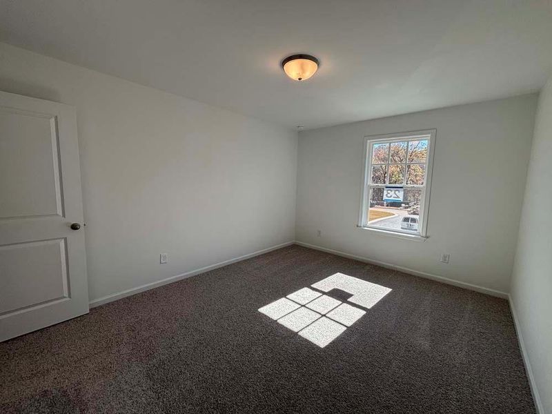 Spacious, unfurnished interior of a new home in Creekside, Dawsonville (Image 21).