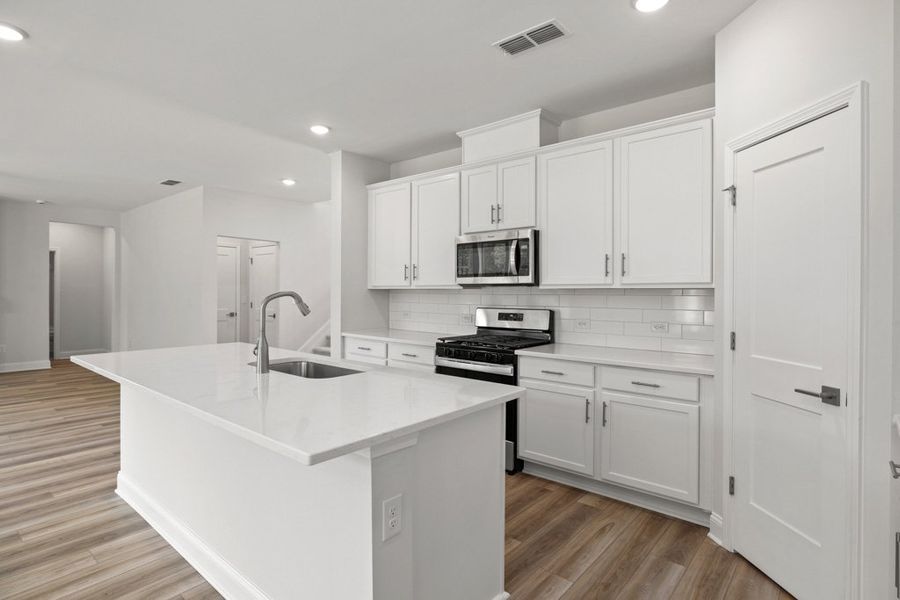 Representative furnished interior of a home built from the Charlton by UnionMain Homes in Austin Springs, Bethlehem (Image 7).