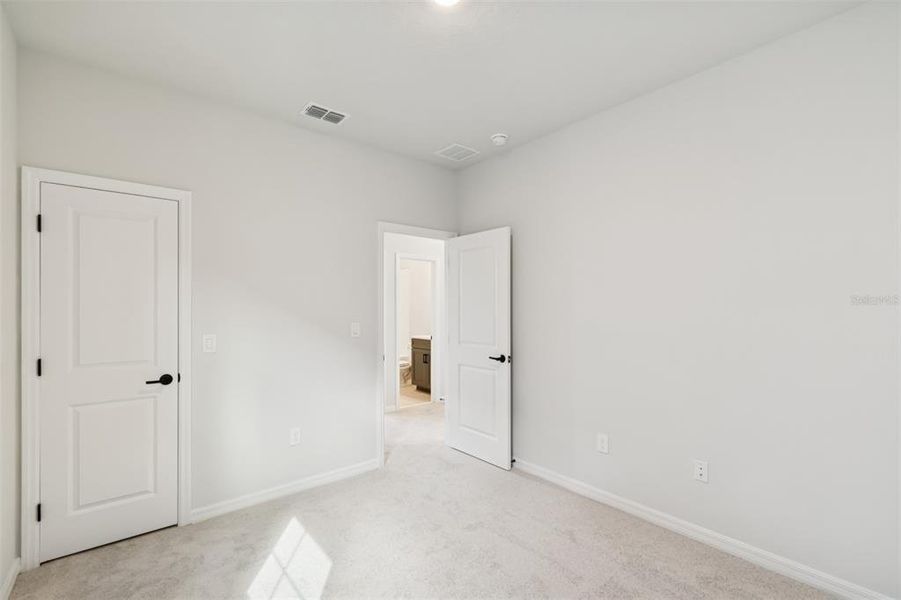 Spacious, unfurnished interior of a new home in Laureate Park at Lake Nona - Garden Series, Orlando (Image 39).