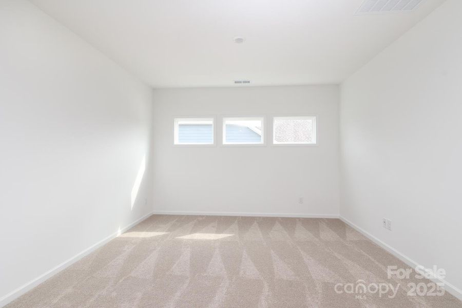 Spacious, unfurnished interior of a new home in Estates at Sugar Creek, Indian Land (Image 36).