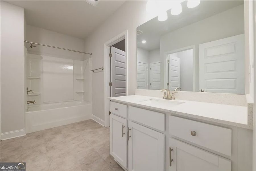 Furnished interior view inside a new home in Oakview Estates, Macon (Image 13).