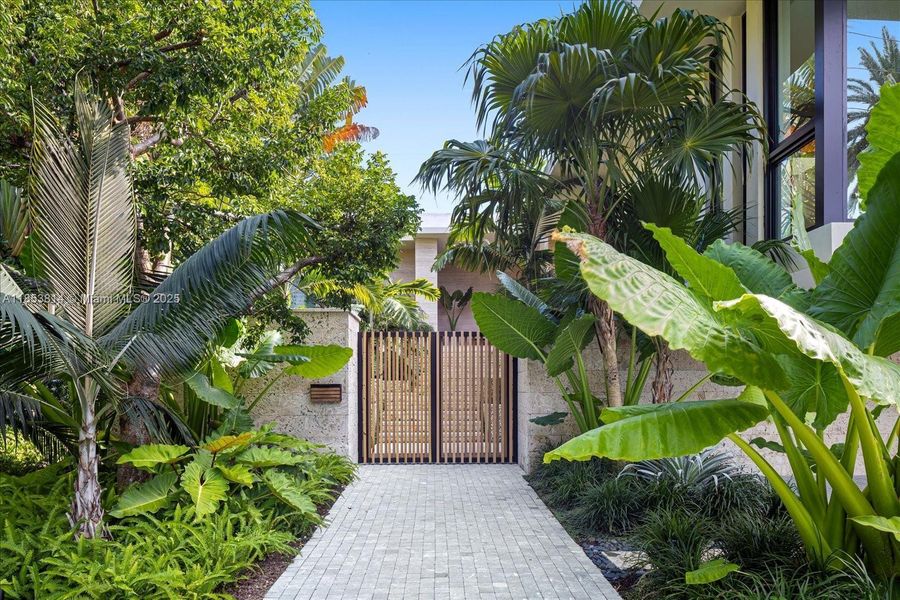 Front exterior of a new home in , Miami Beach, FL, highlighting curb appeal (Image 1). Front exterior of a new home in , Miami Beach, FL, highlighting curb appeal (Image 1).