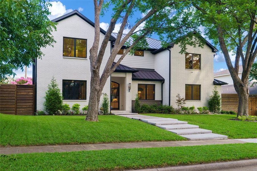 Front exterior of a new home in , Dallas, TX, highlighting curb appeal (Image 27).