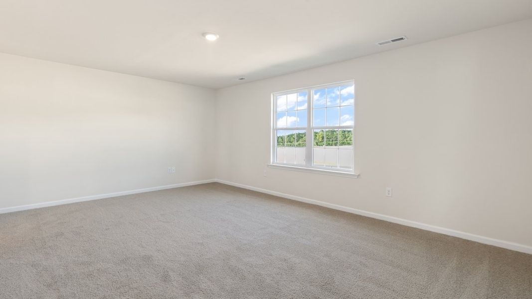Spacious, unfurnished interior of a new home in The Grove at Matthews Landing, Fuquay Varina (Image 23).