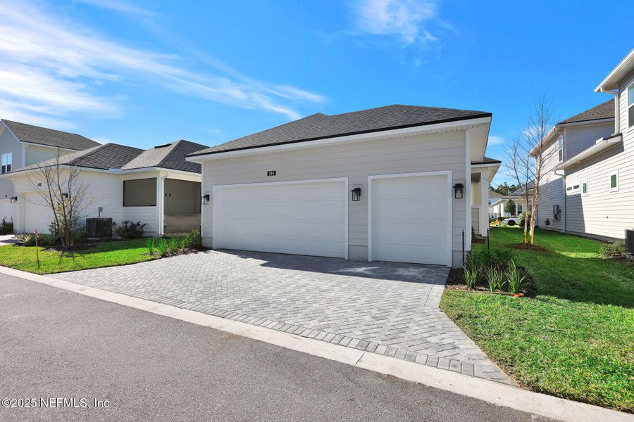Front exterior of a new home in , Ponte Vedra, FL, highlighting curb appeal (Image 22).