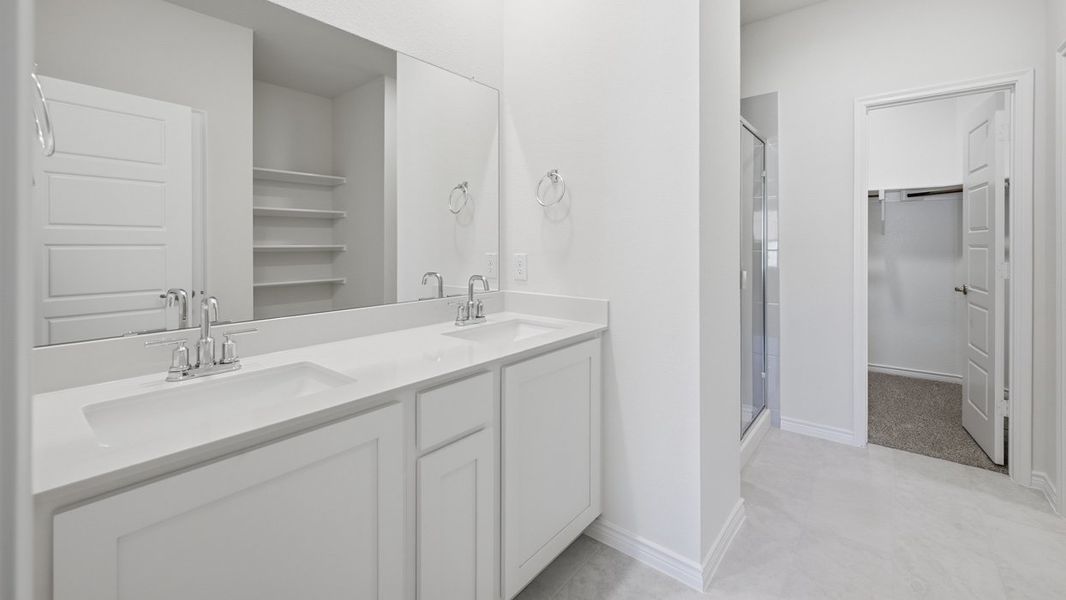 Representative furnished interior of a home built from the Tanzanite by D.R. Horton in Silverado, Aubrey (Image 8).