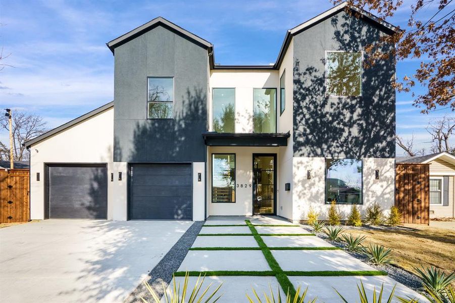 Contemporary home featuring a garage