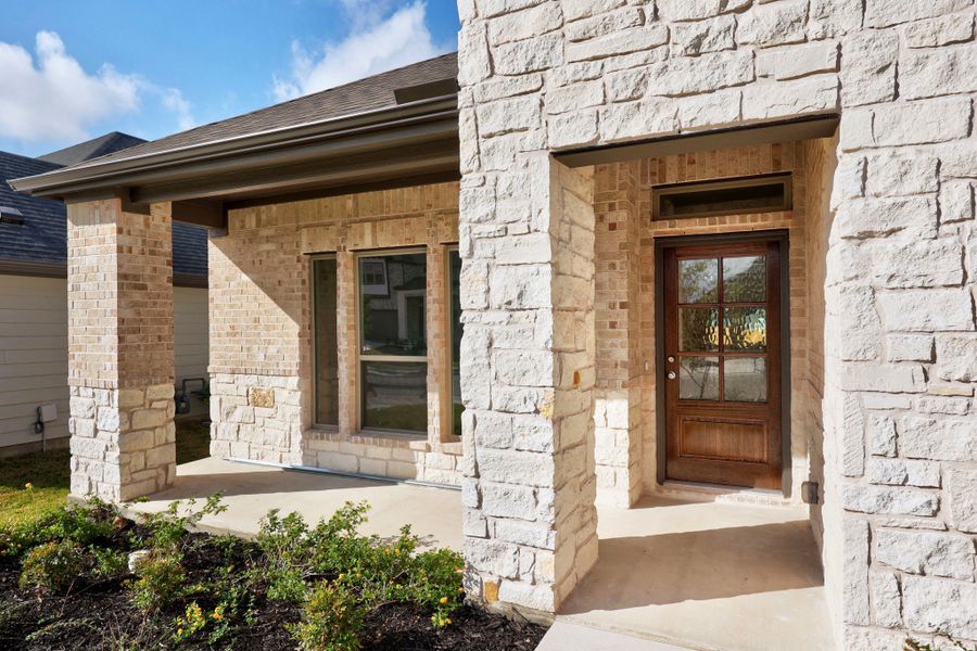 Exterior details and patio area of a home in Prairie Winds, Hutto (Image 3).