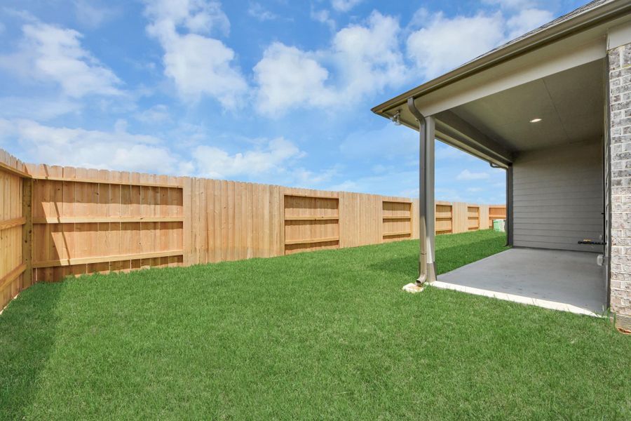 Backyard retreat, offering an abundance of space for kids to play and explore. The possibilities are endless in this outdoor haven, where the joy of open-air activities and family gatherings awaits.