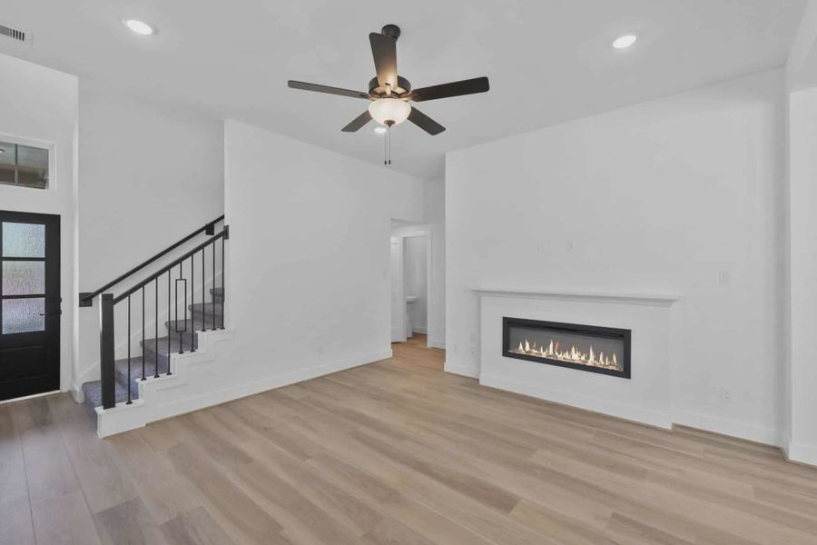 Representative unfurnished interior of a home built from the Versailles by Chesmar Homes in Meridiana Chateau, Manvel (Image 23).