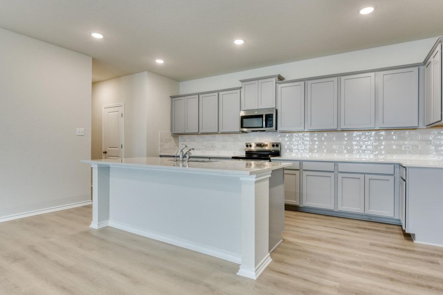 Representative furnished interior of a home built from the McKinney by Ashton Woods in Meadows at Hennersby Hollow 40's, San Antonio (Image 5).