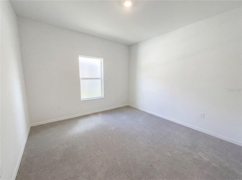 Spacious, unfurnished interior of a new home in Grand Park, Dunnellon (Image 18).