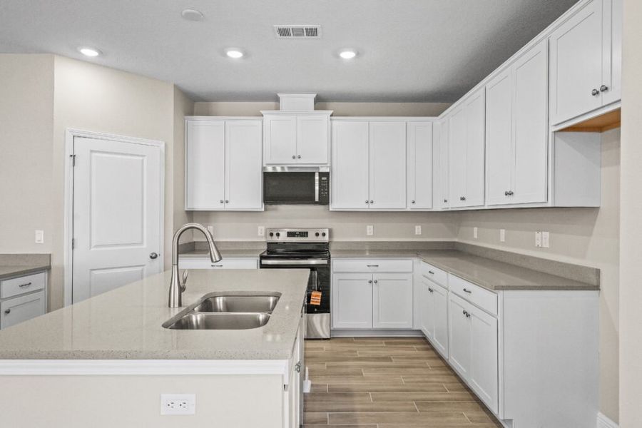 Furnished interior view inside a new home in Natureview, Freeport (Image 7).