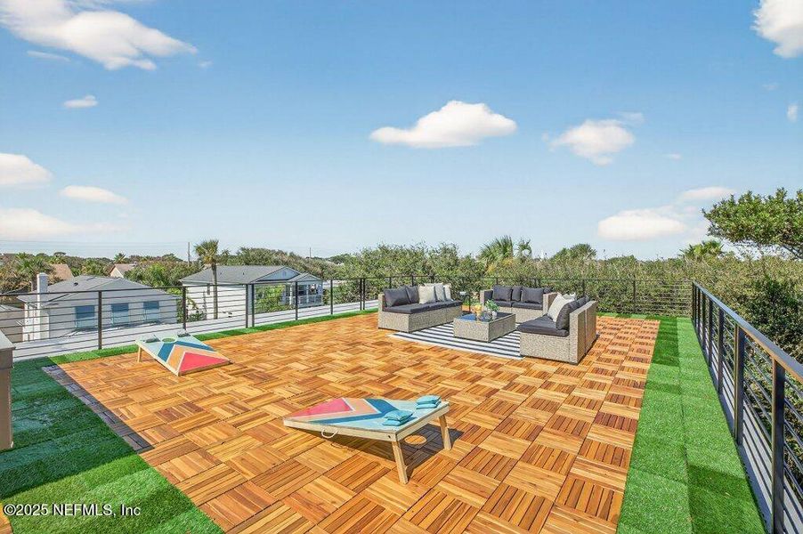 Exterior details and patio area of a home in , Neptune Beach (Image 48).