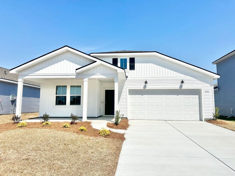 Front exterior of a new home in Arcadia, Myrtle Beach, SC, highlighting curb appeal (Image 22).