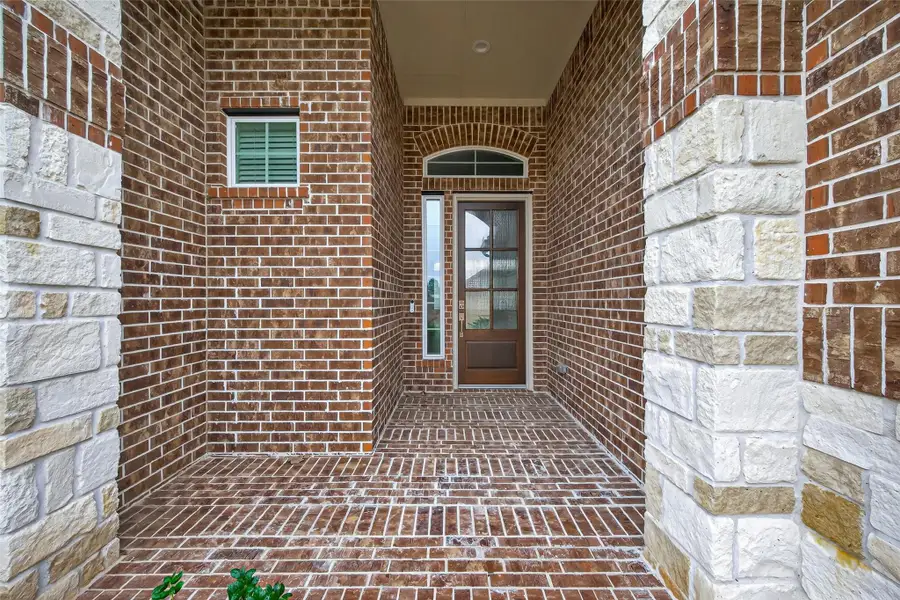 Exterior details and patio area of a home in Artavia, Conroe (Image 3).