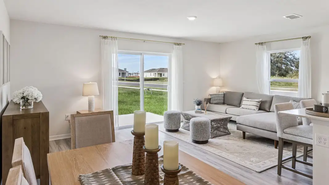 Furnished interior view inside a new home in Atria at Ridgewood Lakes, Davenport (Image 8).