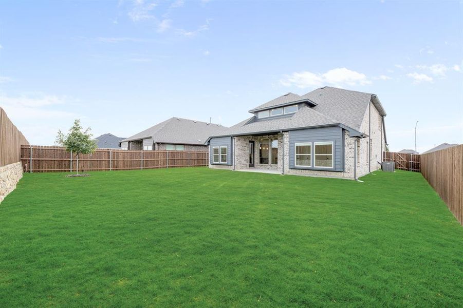 Exterior details and patio area of a home in Wildflower Ranch 60-65, Fort Worth (Image 25). Exterior details and patio area of a home in Wildflower Ranch 60-65, Fort Worth (Image 25).