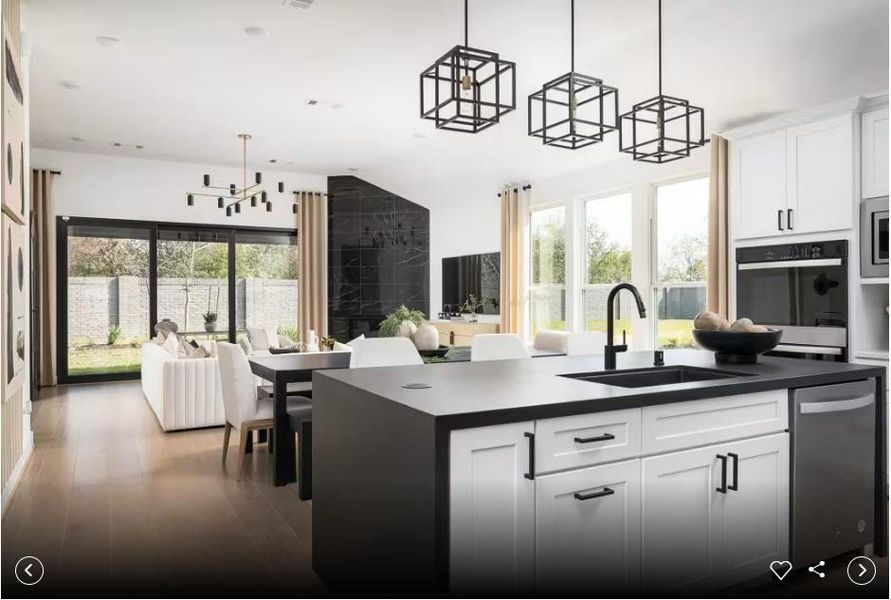 Photo of Pulte model home with same floor plan, not of actual home listed. Photo of Pulte model home with same floor plan, not of actual home listed.