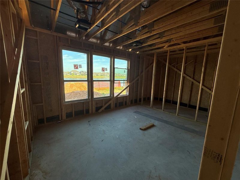 Primary bedroom with lake views Primary bedroom with lake views