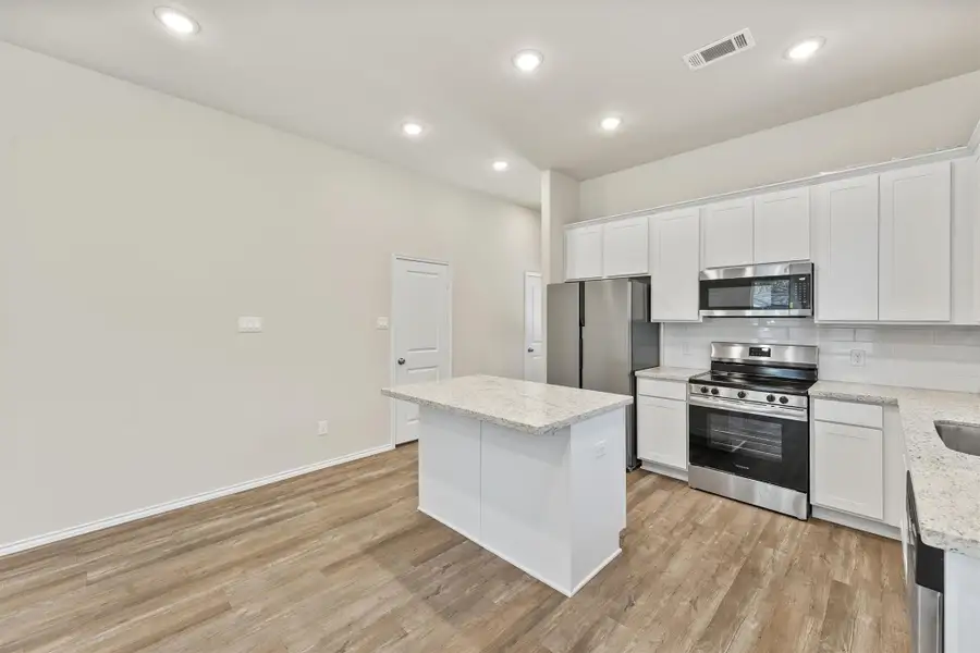 Furnished interior view inside a new home in , Willis (Image 7).