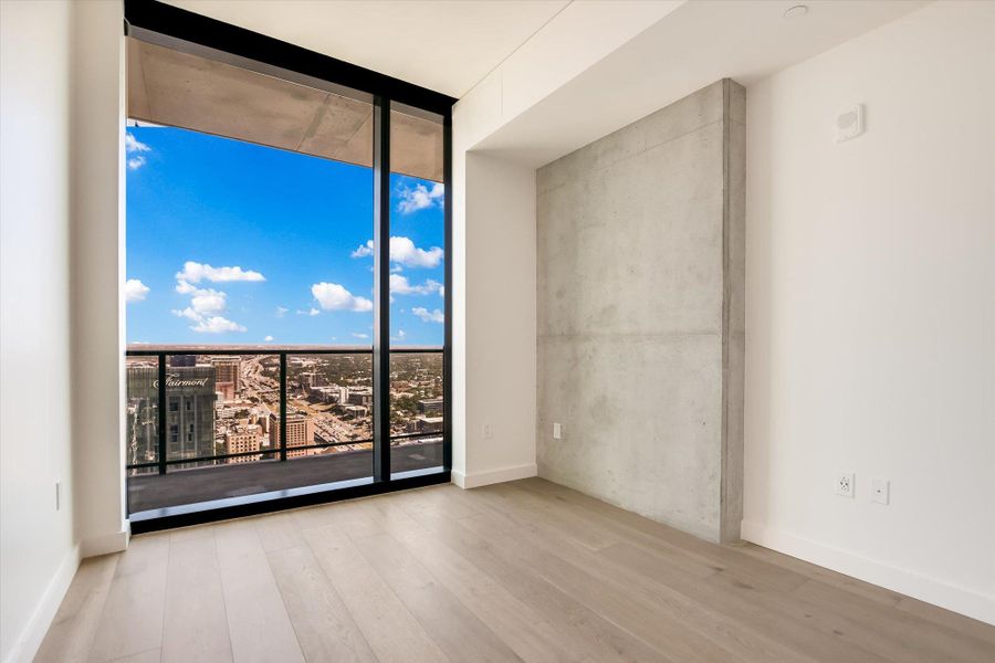 Photos shown are of the same floor plan three floors higher.