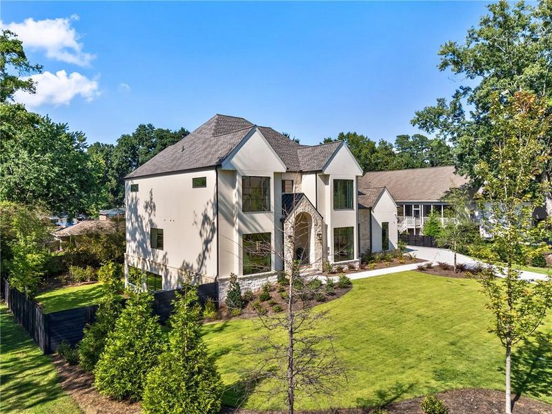 Front exterior of a new home in , Alpharetta, GA, highlighting curb appeal (Image 26). Front exterior of a new home in , Alpharetta, GA, highlighting curb appeal (Image 26).