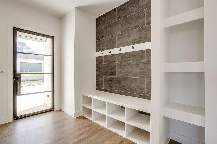 Mudroom featuring wood finished floors Mudroom featuring wood finished floors