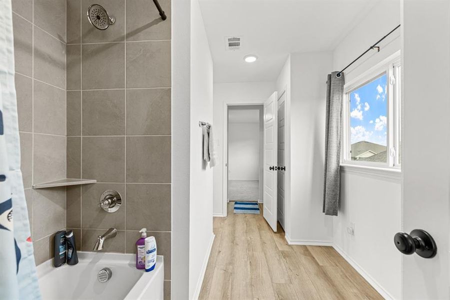 Furnished interior view inside a new home in Waterscape 50s Sales Phase 2, Royse City (Image 12).