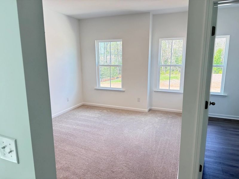 Spacious, unfurnished interior of a new home in Rowland's Grant, Fuquay Varina (Image 20).