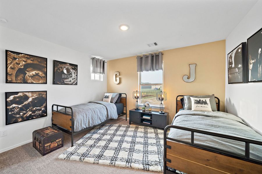 A bedroom with two beds. A bedroom with two beds.