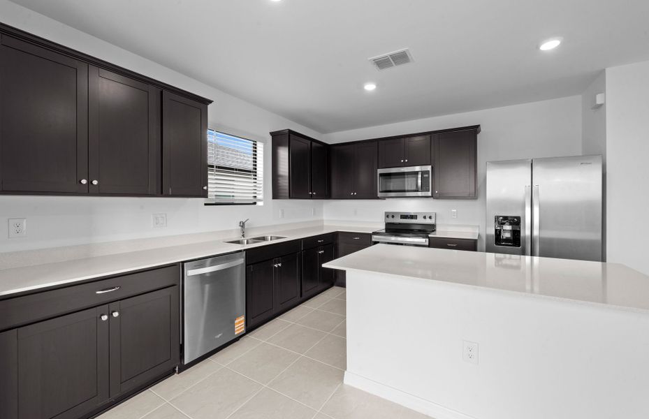 Furnished interior view inside a new home in Whispering Lakes, Lehigh Acres (Image 4).