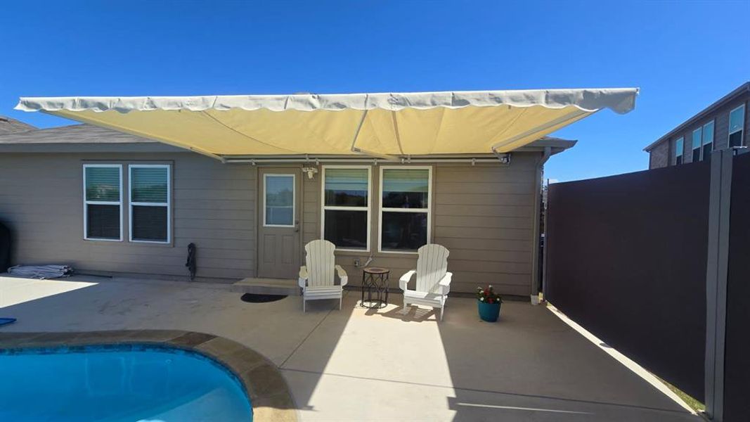 Electric patio and pool awning that can be extended and retracted.