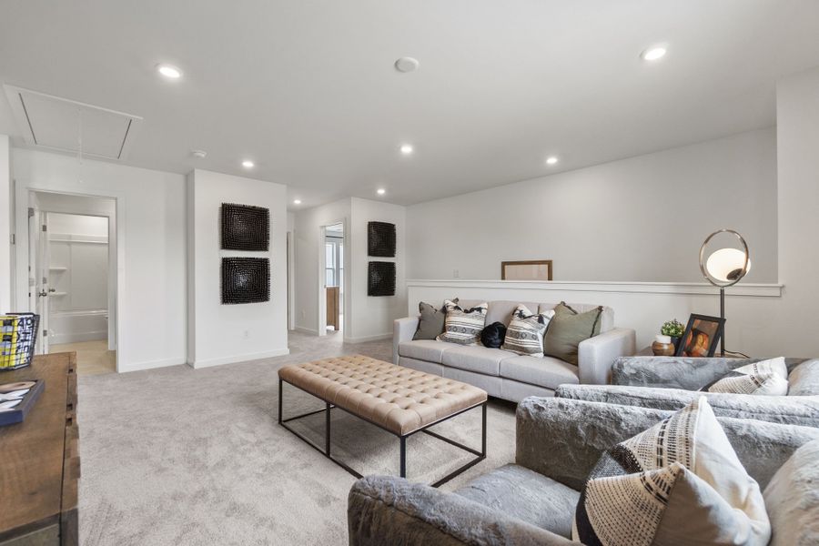 A living room with a couch and a coffee table.