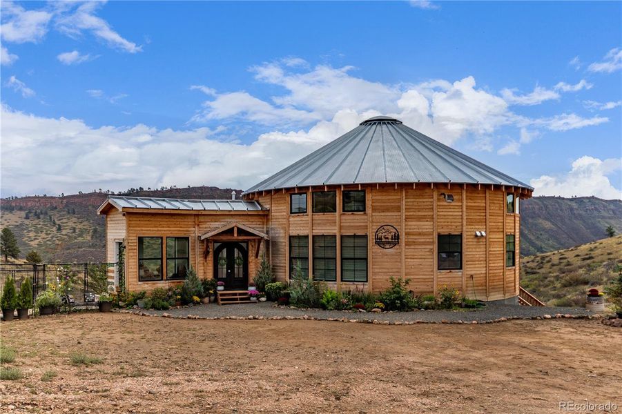 Front exterior of a new home in , Lyons, CO, highlighting curb appeal (Image 26).