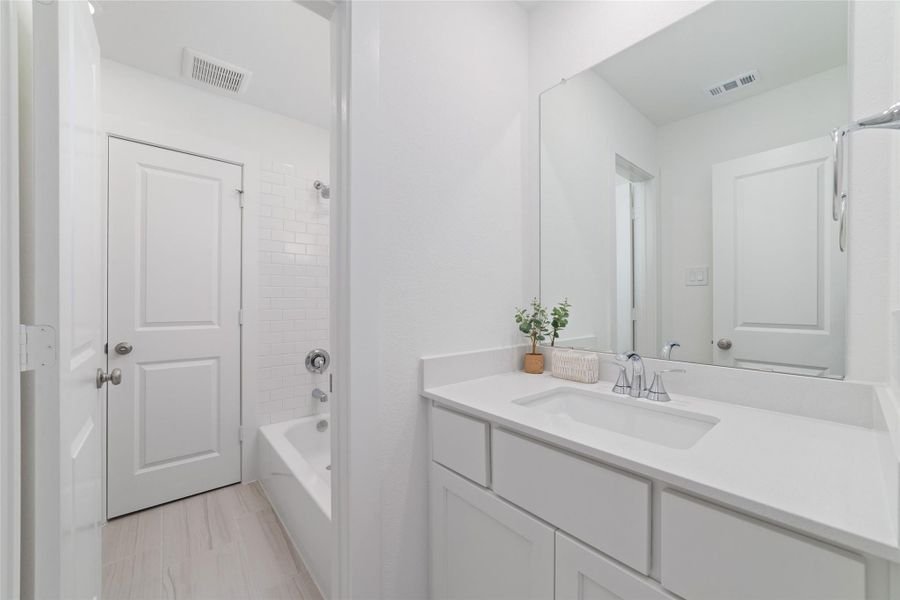 Furnished interior view inside a new home in Elyson, Katy (Image 11).