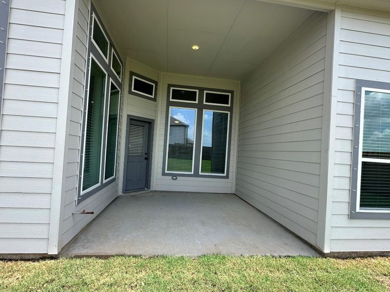 Exterior details and patio area of a home in Creekhaven, Iowa Colony (Image 21). Exterior details and patio area of a home in Creekhaven, Iowa Colony (Image 21).