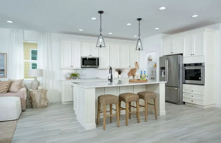 Representative furnished interior of a home built from the Trinidad Bay by Minto Communities in Latitude Margaritaville Watersound, Panama City Beach (Image 5).