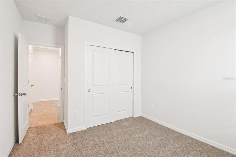 Spacious, unfurnished interior of a new home in Two Rivers - Classic Series, Zephyrhills (Image 13).