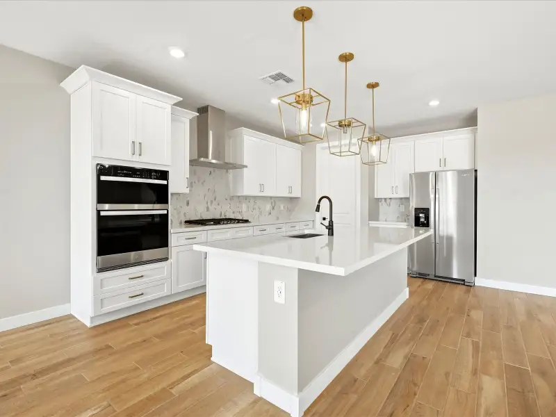 Furnished interior view inside a new home in Legacy Place, Glendale (Image 3).