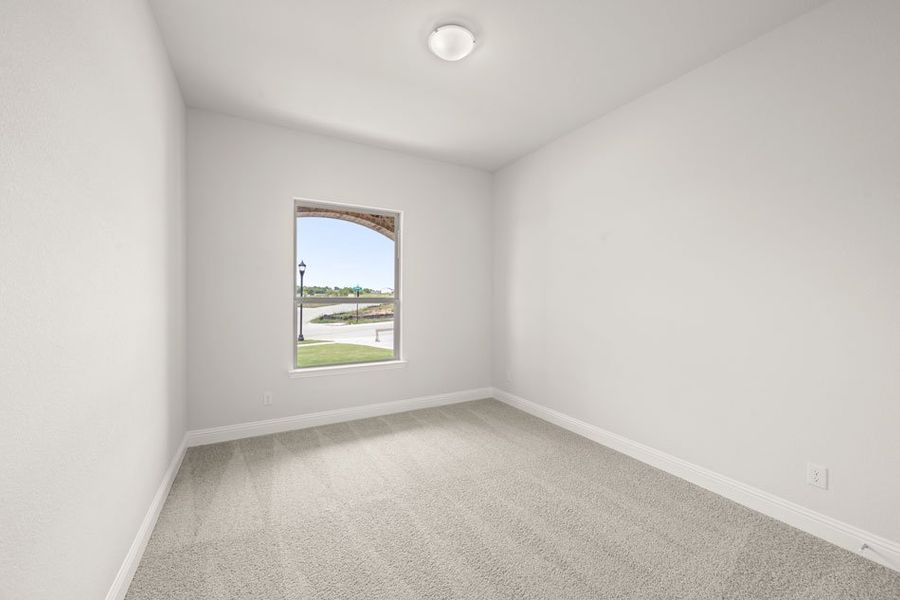 Representative exterior photo of a completed home built from the Balmoral by Impression Homes in Timberbrook, Justin, TX (Image 17).