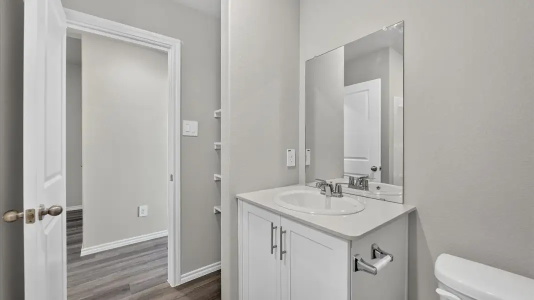 Furnished interior view inside a new home in Rosewood at Beltmill, Fort Worth (Image 11).