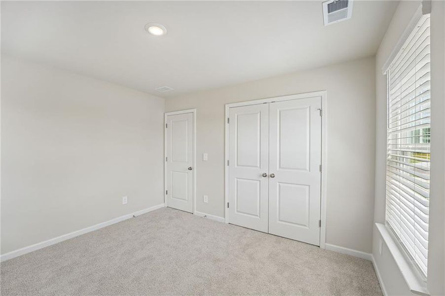 Spacious, unfurnished interior of a new home in Northwoods at Mirror Lake, Villa Rica (Image 44).