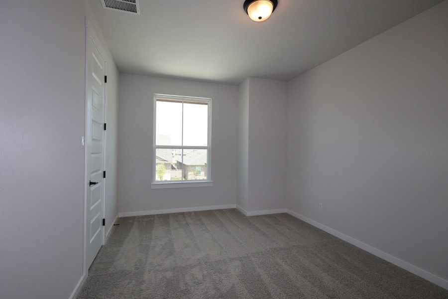 Spacious, unfurnished interior of a new home in Flora, Hutto (Image 9).